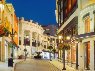 A Building With A Store On A City Street