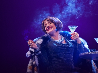 Patti LuPone Standing On A Stage