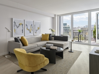 A Living Room With A Large Window
