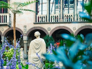 A Statue In Front Of A Building
