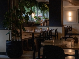 A Room With Tables And Chairs