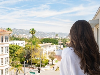 A Person Looking Out Over A City