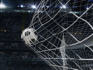 A Football Ball In A Net