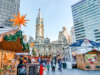 A Street With Buildings And People