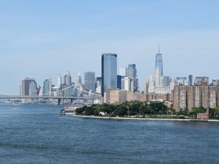 A City Skyline With A Bridge