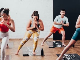A Group Of People Exercising