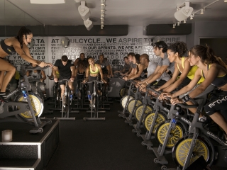 A Group Of People On Bikes