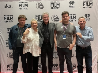 A Group Of People Posing For A Photo