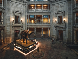 A Large Room With A Statue In It