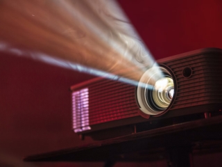 A Close Up Of A Car's Headlight
