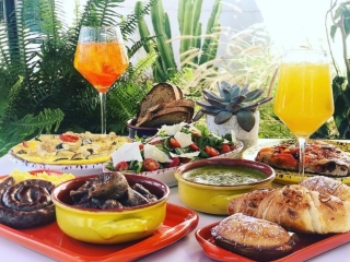 A Table Is Filled With Food