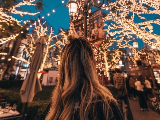 A Person Looking At A Clock Tower