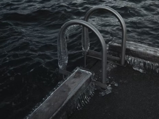 A Metal Railing On A Dock
