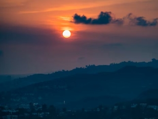 A Sunset Over A City