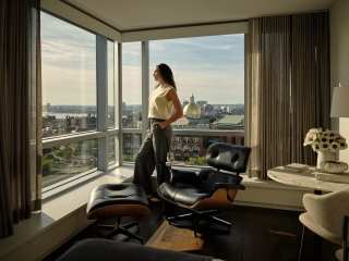 A Person Standing On A Chair