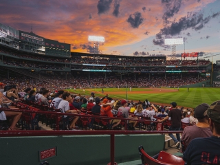 A Baseball Stadium With A Full Crowd