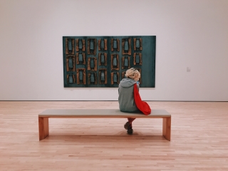 A Person Sitting On A Bench