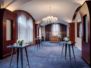 A Room With A Table And Chairs