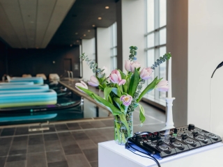A Vase Of Flowers On A Counter