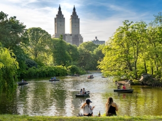 People In Boats On A River