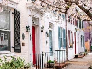A Row Of Houses With Windows