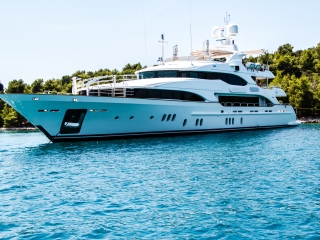 A Large White Boat On Water