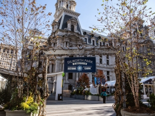 A Building With Trees In Front Of It