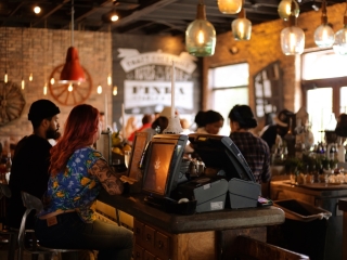 A Group Of People In A Restaurant