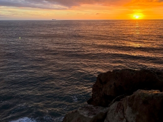A Sunset Over The Ocean