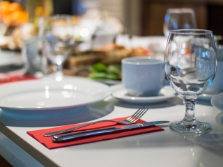 A Table With Plates And Glasses