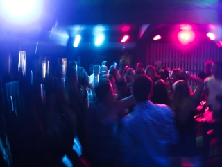 A Crowd Of People At A Concert