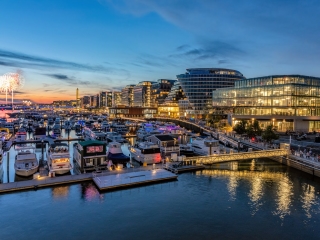 A City With Many Boats And Buildings