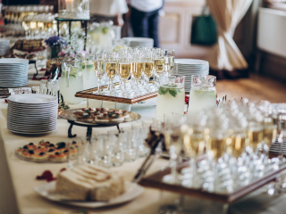 A Table Full Of Plates And Glasses